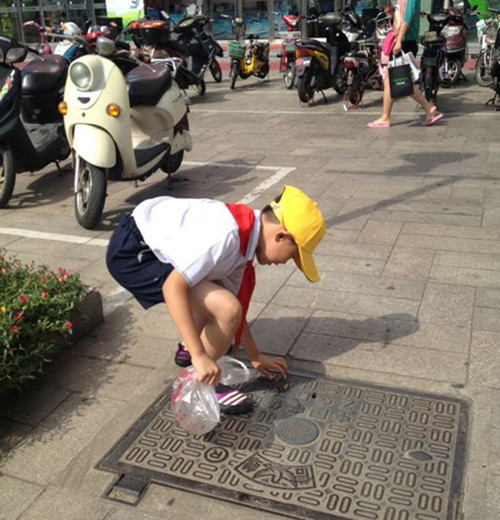 南通市通师二附暑期社区实践活动:我是小小志愿者