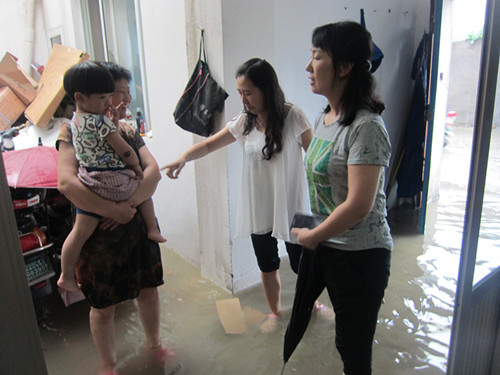 南通市崇川区朝晖社区:积极应对暴雨天气,用心